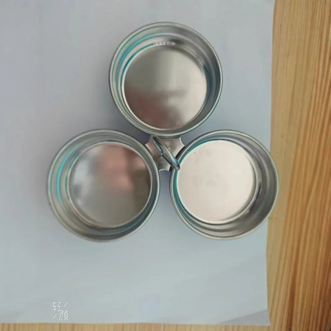 Mini stainless steel heart-shaped and round egg steamer cooker for single eggs.