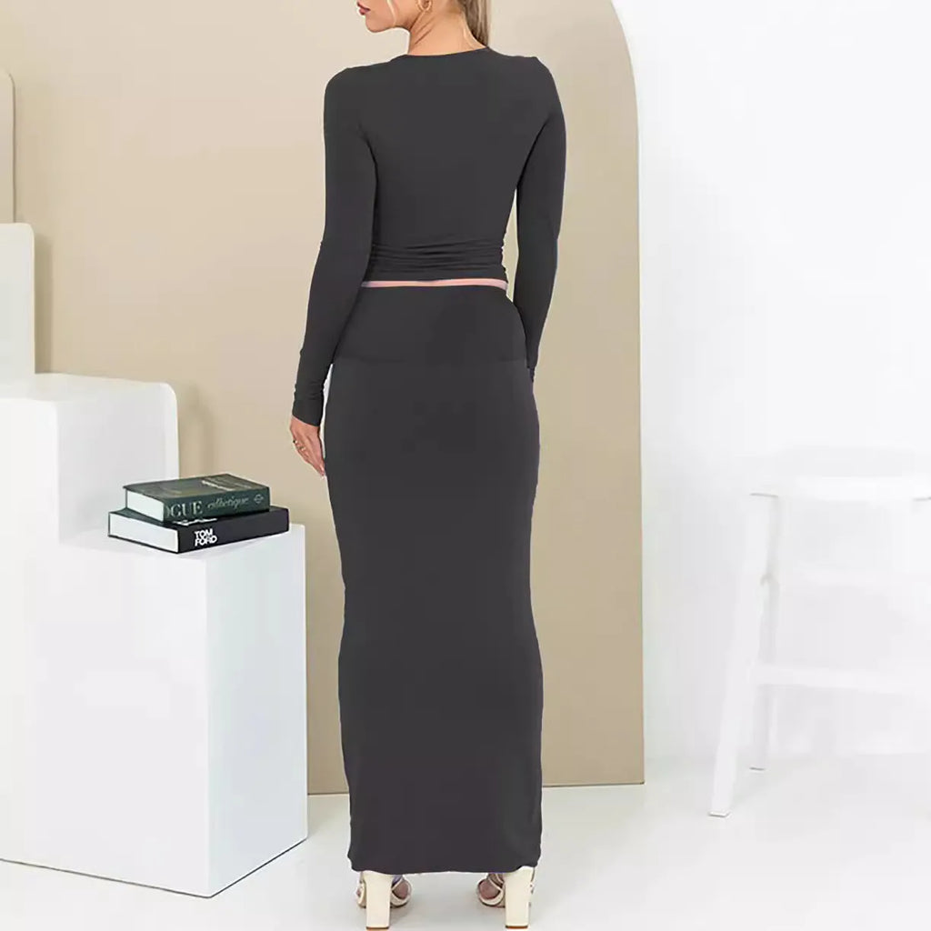 Women's black polyester two-piece suit with three-quarter sleeve top and long skirt, sweet style.