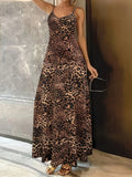 Dark brown leopard print women's long dress with sleeveless round neck and sling straps on a mannequin.