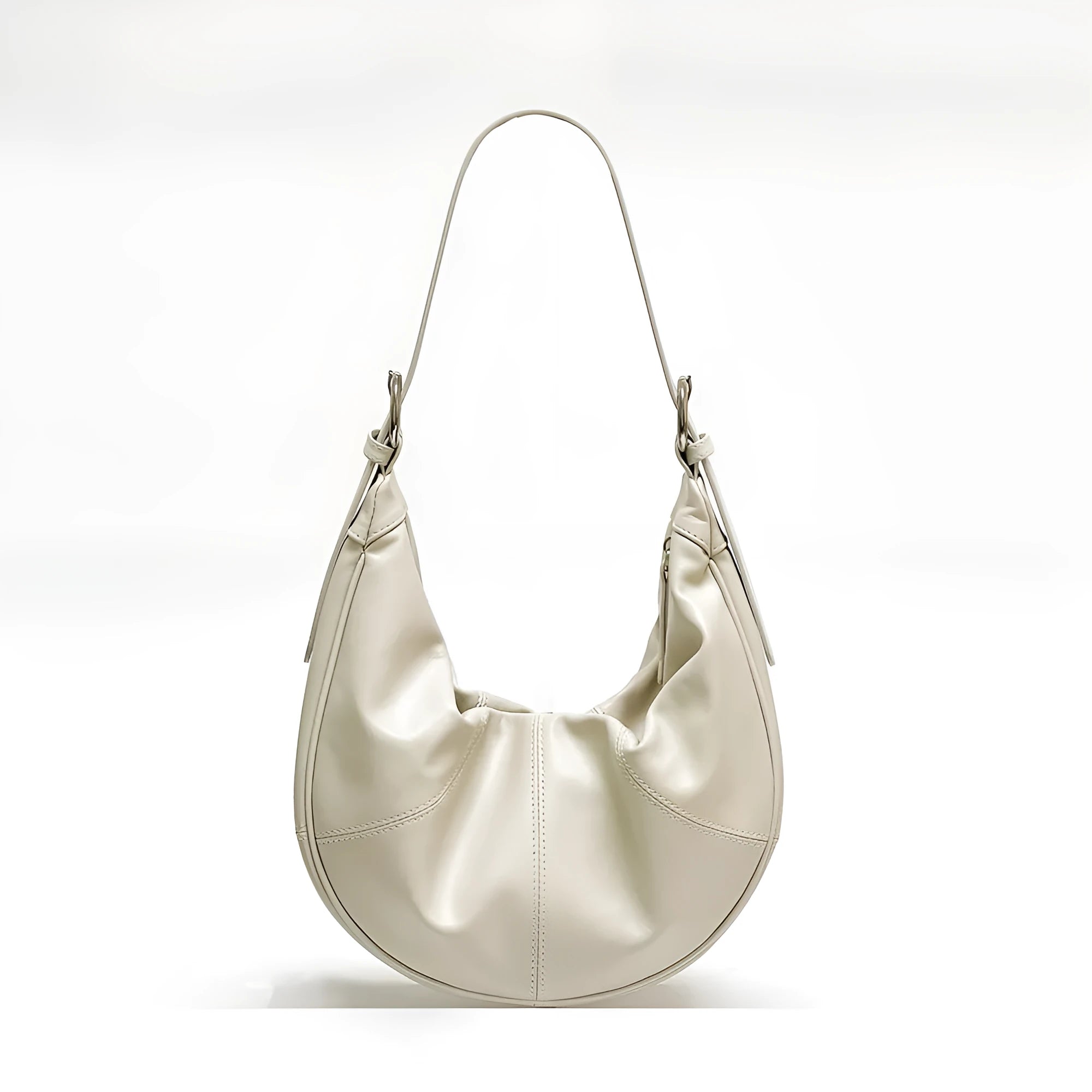 Women's soft cowhide leather dumpling-shaped shoulder bag in silver colour with double straps.