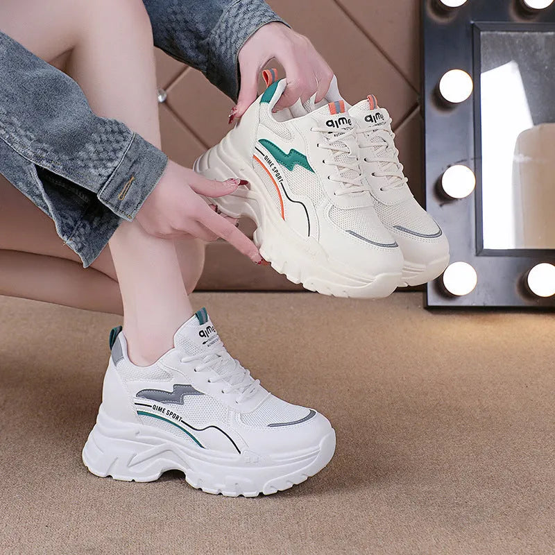 Women's white height increasing sports shoes with cross shoulder straps and rubber sole