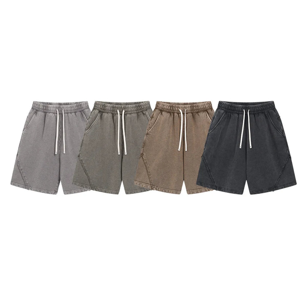 Men's batik-washed cotton terry shorts in a loose fit, shown in a retro colour with patch detail.