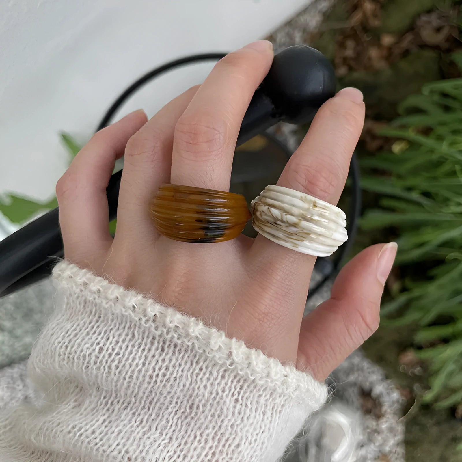 Chinese style geometric resin ring with irregular wide band design in neutral colour