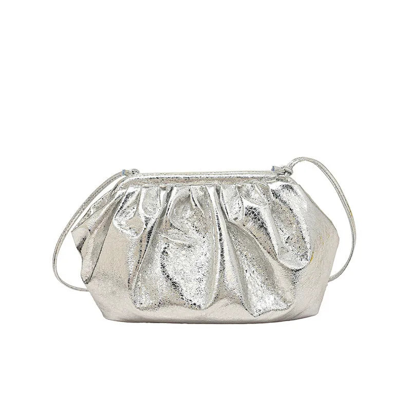 Simple shell-shaped PU leather crossbody bag in rose red with internal organiser pockets.