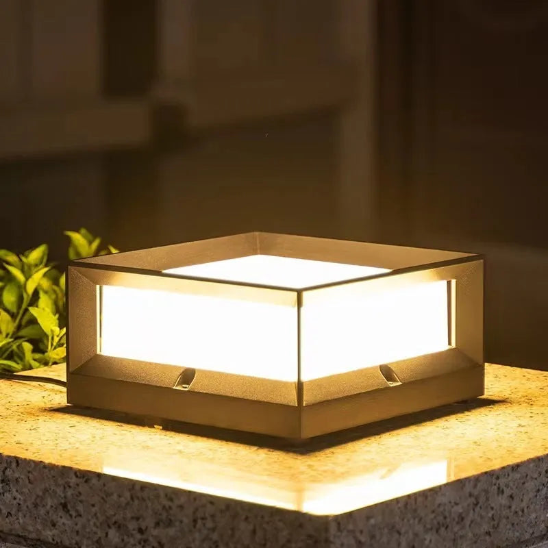 White aluminium solar-powered LED outdoor column light for wall or garden mounting.
