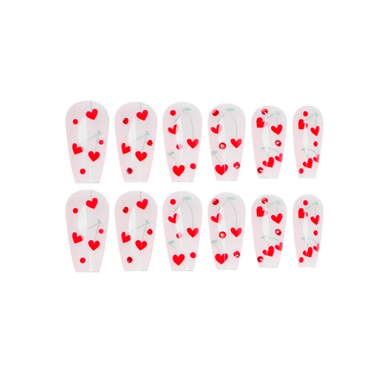 Set of 24 cherry blossom French manicure press-on nails with red diamond accents and glue tube