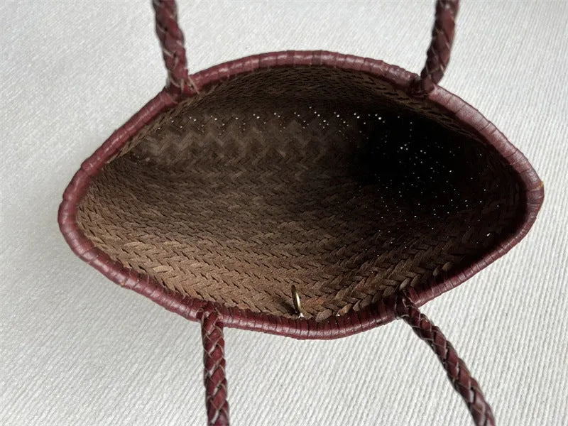 Brown woven leather tote bag with three-dimensional pockets measuring 27cm high by 30cm wide