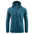 Man wearing a lightweight grey hooded summer jacket made from thin nylon fabric.
