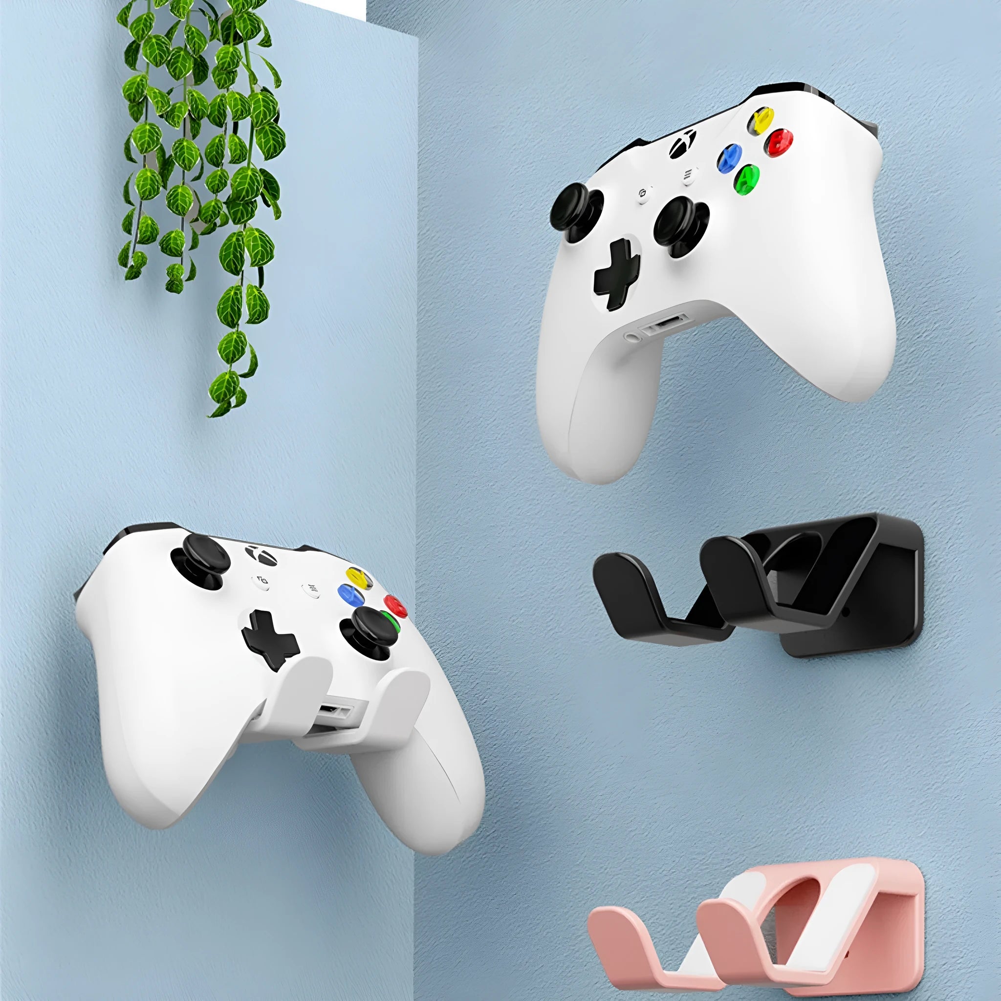 ABS plastic wall hanging rack for game controllers in black, white and pink colours with adhesive mounting