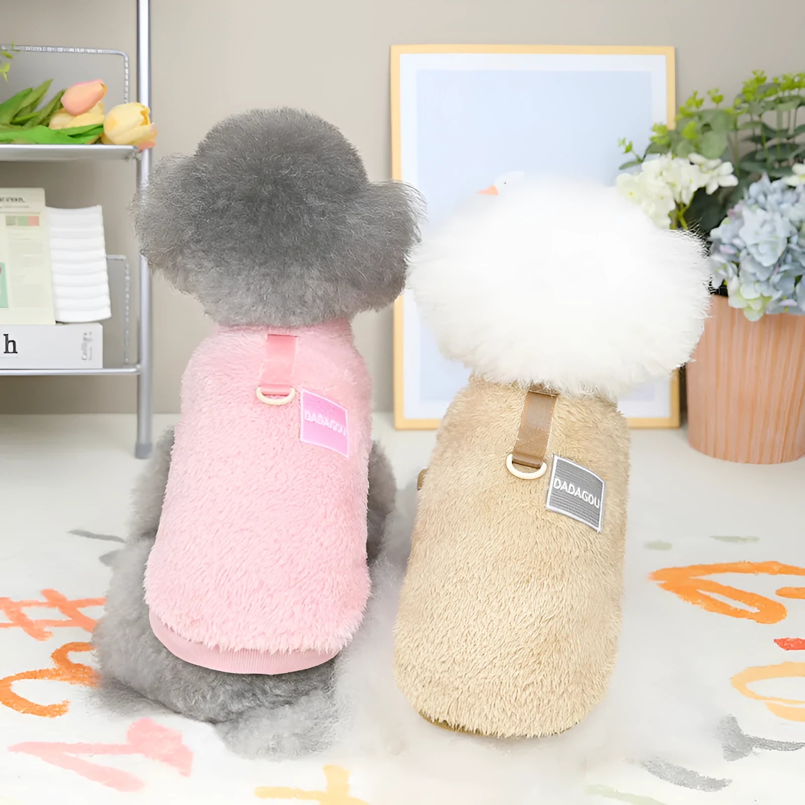 A blue coral fleece jacket for a dog, showing leg coverage and soft fabric texture.