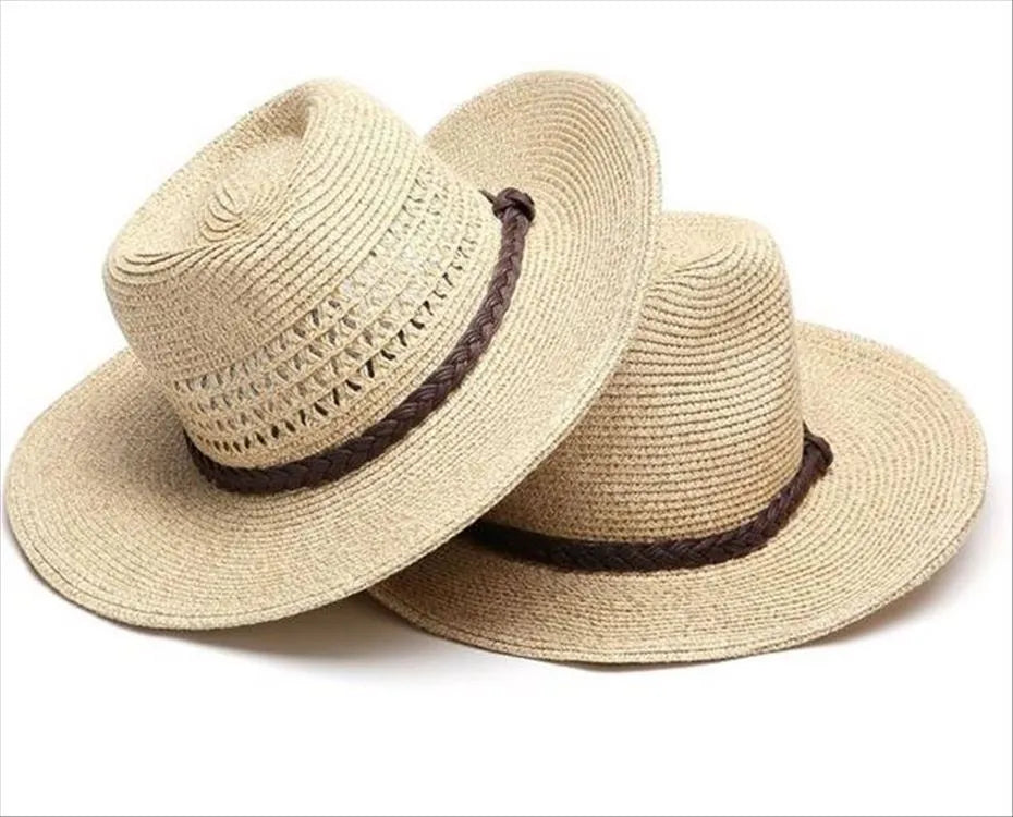 Men's foldable wide brim straw sun hat in beige, shown in a travel context.