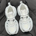 Beige mesh sports shoes with wedge heel platform and front lace-up fastening