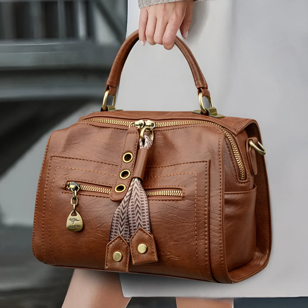 Retro simple style women's one-shoulder crossbody bag in soft PU leather, shown in a horizontal square shape.