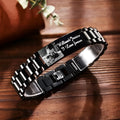 Men's curved heart-shaped stainless steel bracelet with engraved lettering, presented in a gift box.