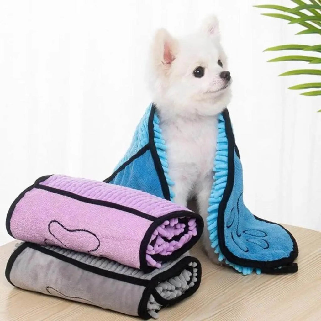 Blue dog bath robe towel laid flat showing 62cm by 23cm size and soft fibre texture