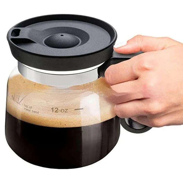 Transparent borosilicate glass coffee maker with grey silicone sleeve cover