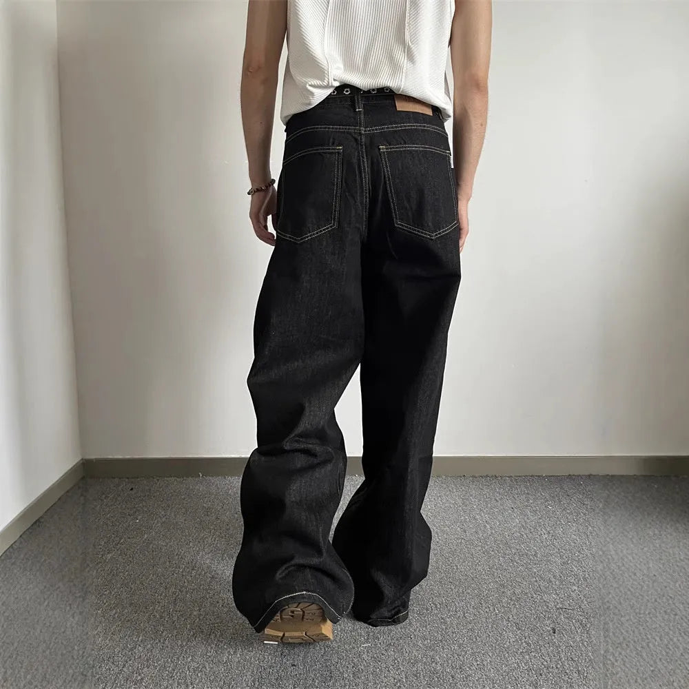 Black retro straight-leg jeans with loose wide-leg design and zip placket closure