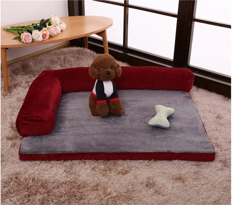 Corduroy pet dog bed with bolster sides on a non-slip base, shown in grey colour.