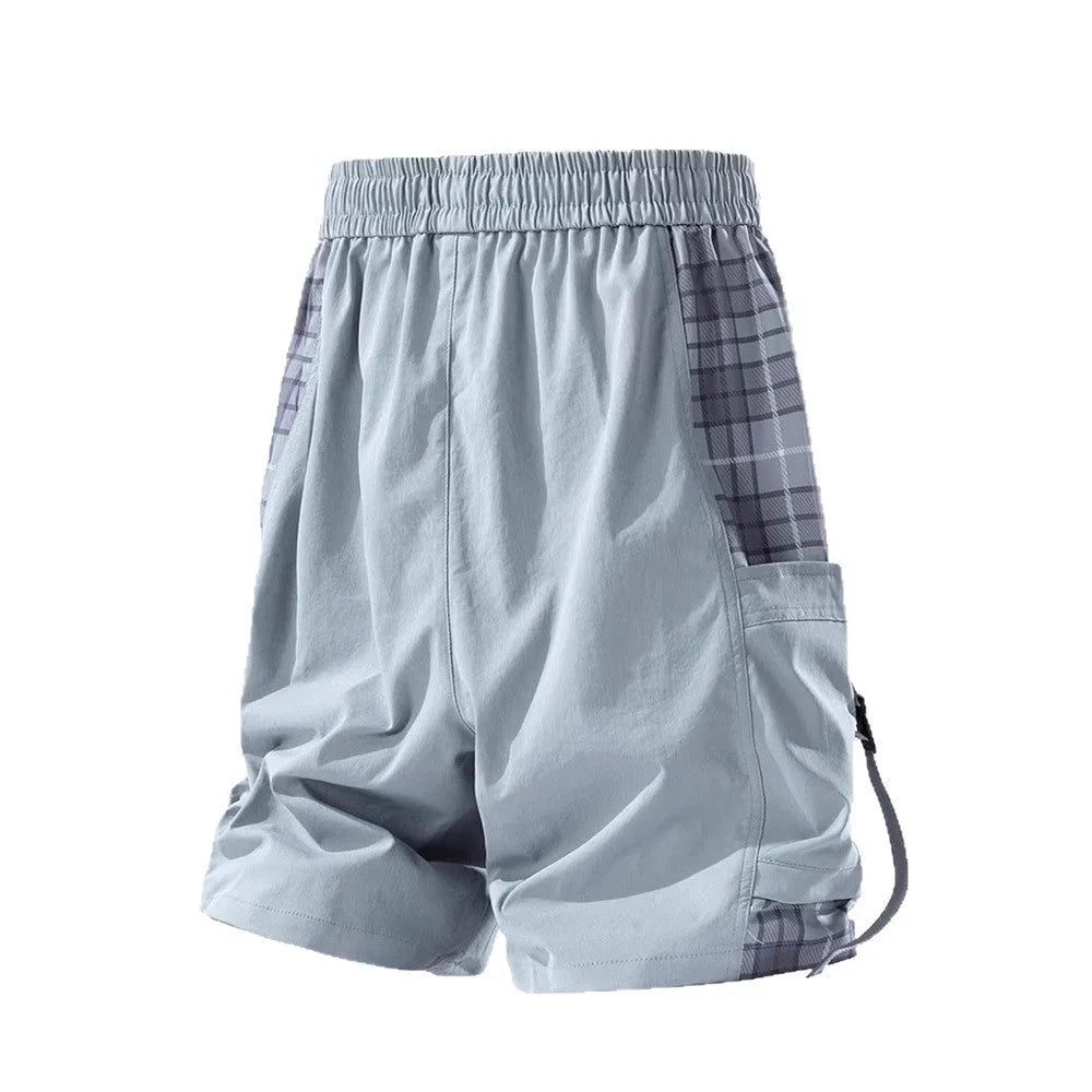Men's loose-fit cargo shorts with plaid stitching detail in black, grey, or smoky grey.