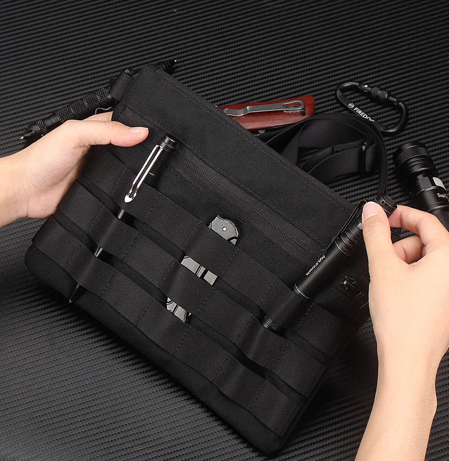 Solid black Oxford cloth portable organiser bag measuring 18cm by 3.5cm.