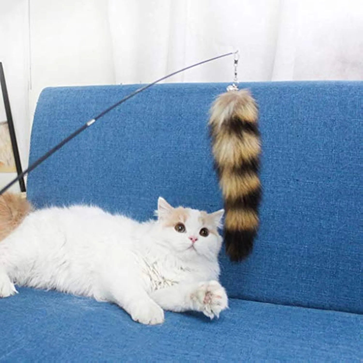 Black cat toy wand with feather teaser on elastic string, 42cm length