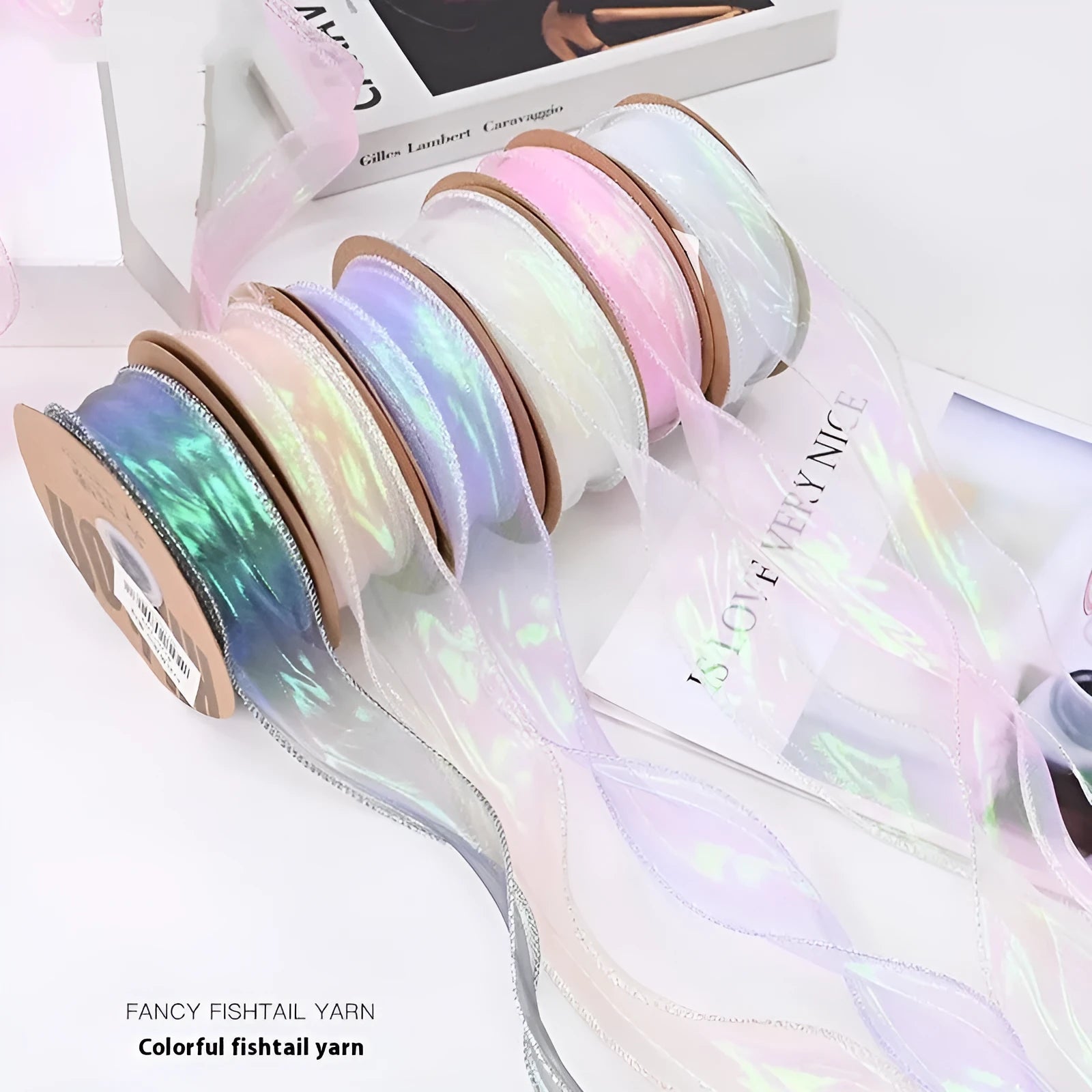 Mesh fishtail yarn ribbon with colourful wave edge in multiple illusion colour options for DIY craft projects.