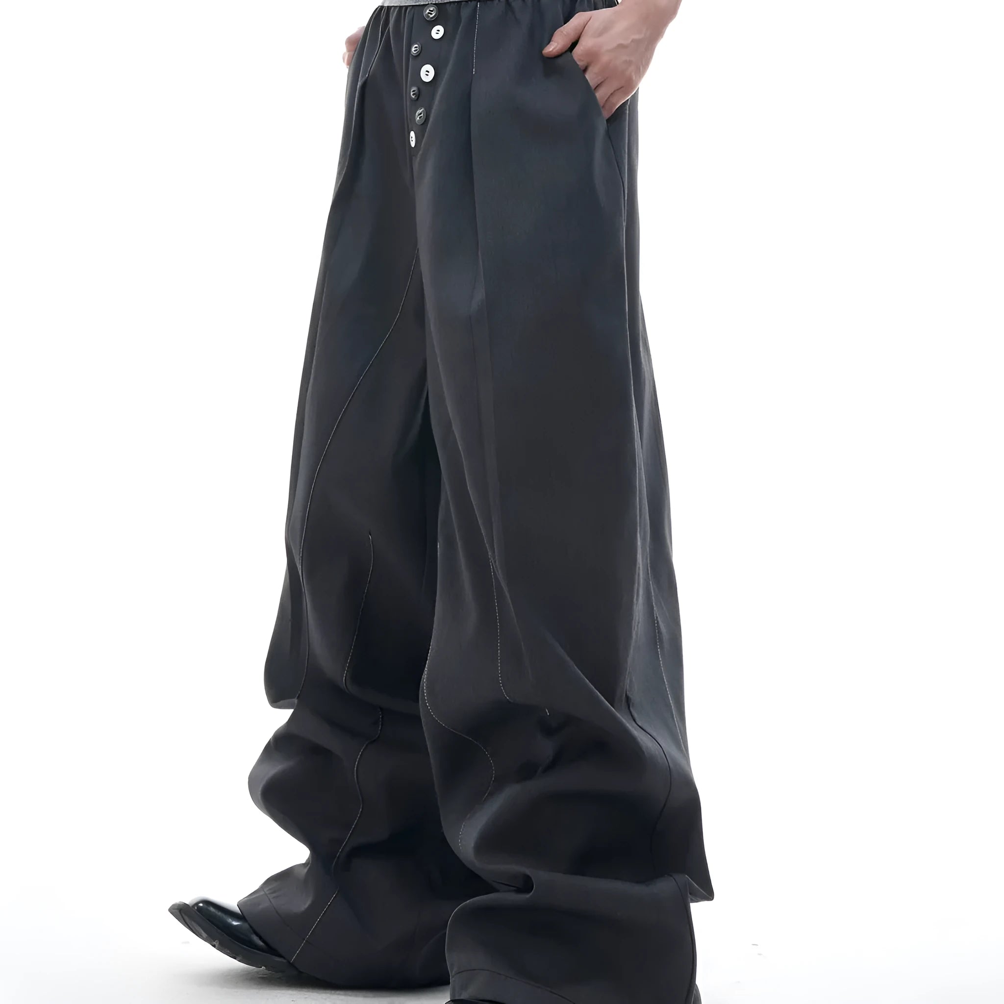High-waisted straight-leg trousers in grey featuring a button-open line design detail on the leg.