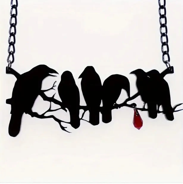 Black crow necklace with Gothic styling and cross chain design