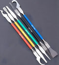 Five-piece stainless steel disassembly tool set with thin blades for plastic removal.