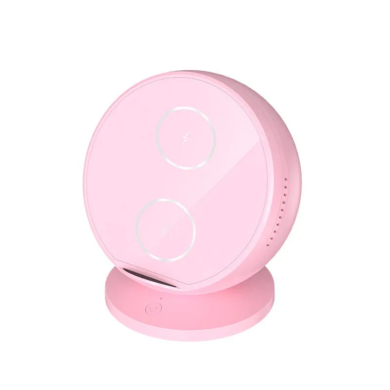 Black multifunctional car phone holder with wireless charging and Bluetooth speaker.