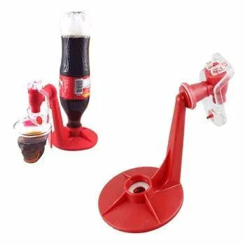 Red plastic Magic Tap soda bottle dispenser attached to a 2-litre drink bottle