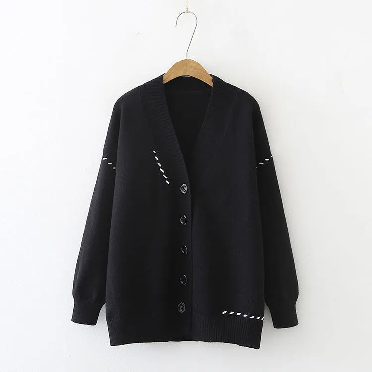 Women's loose fit knitted cardigan top coat in black or white with long sleeves