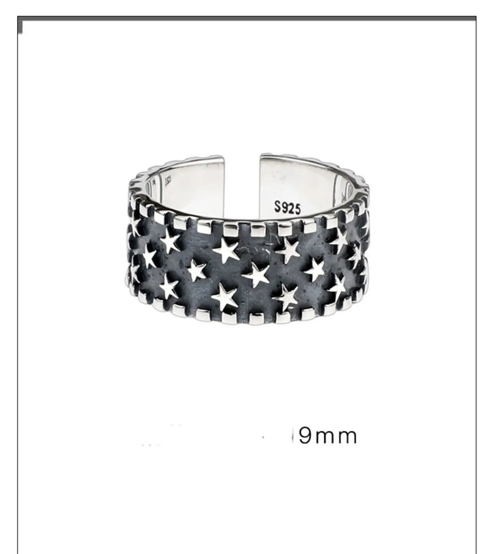 Pure silver ring with multiple five-pointed star patterns and adjustable opening
