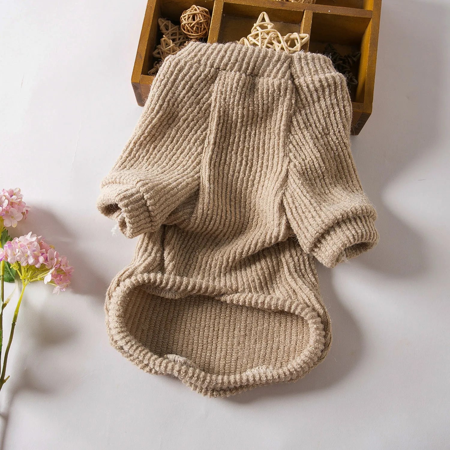 Brown cloth pullover sweater on small dog showing casual style and size fit