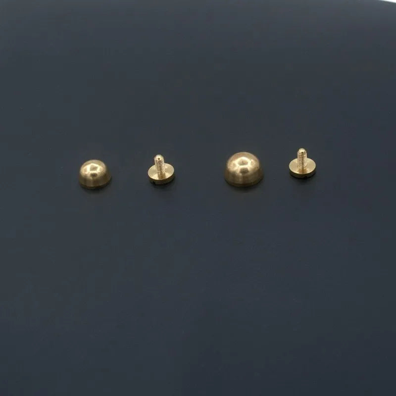 Brass decorative buckle foot nails in round and geometry bucket designs, sizes 10x6mm and 12x7mm.