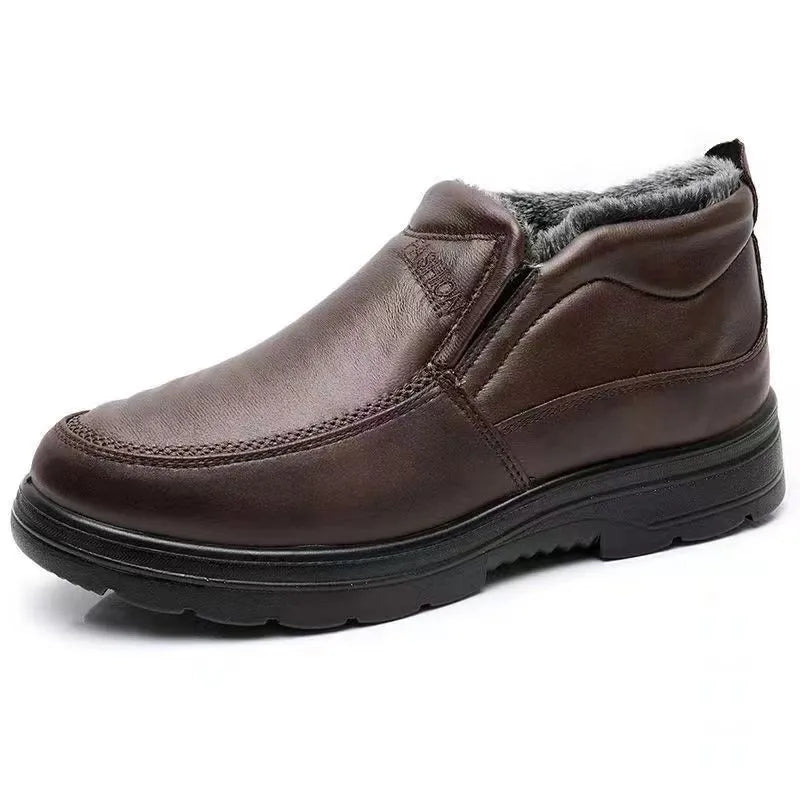 Men's black winter slip-on shoes with fleece lining and a textured non-slip rubber sole.