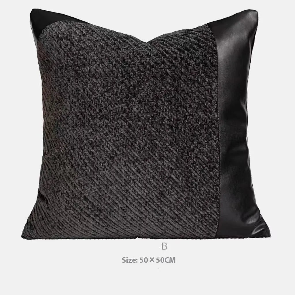Modern grey and white plaid bed runner blanket set with leather round pillow on a bed