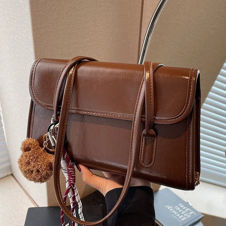 Women's brown Maillard PU leather shoulder bag with square design and pendant detail