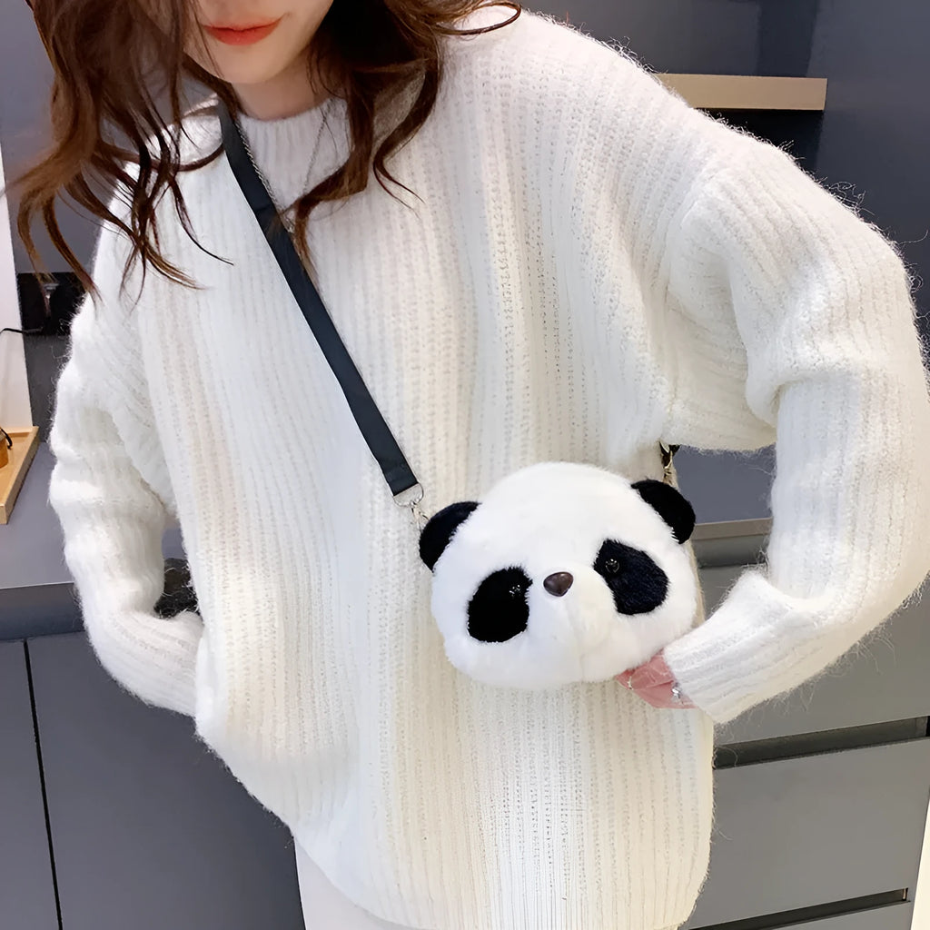 Soft plush crossbody bag with panda head design, cylindrical shape, and an outer sandwich pocket.