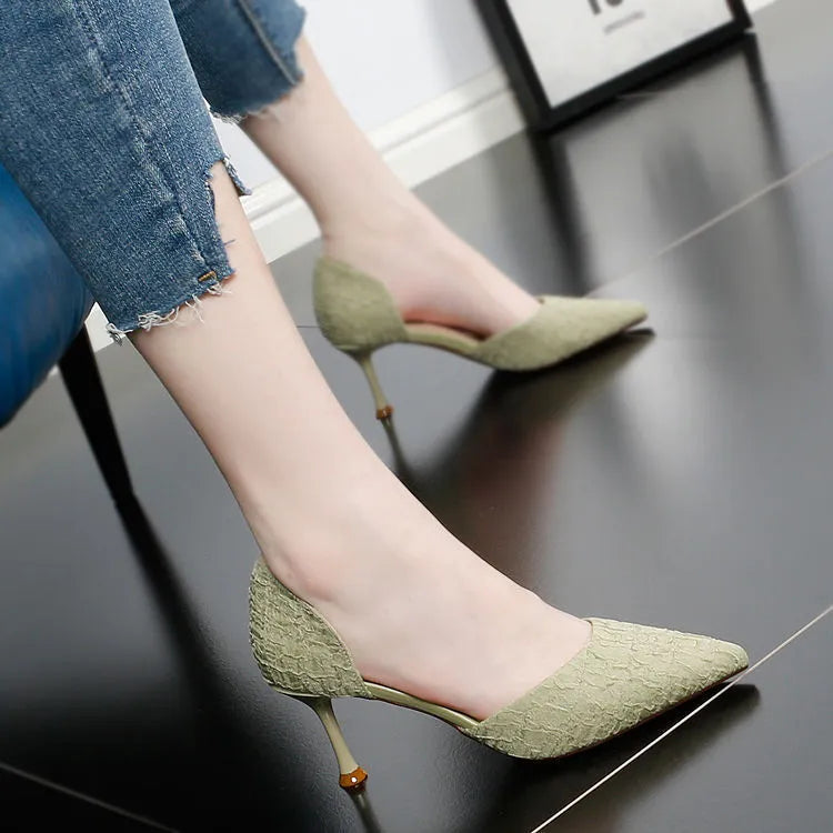 Women's black pointed toe stiletto heels with leather stitching details and 6-8cm heel