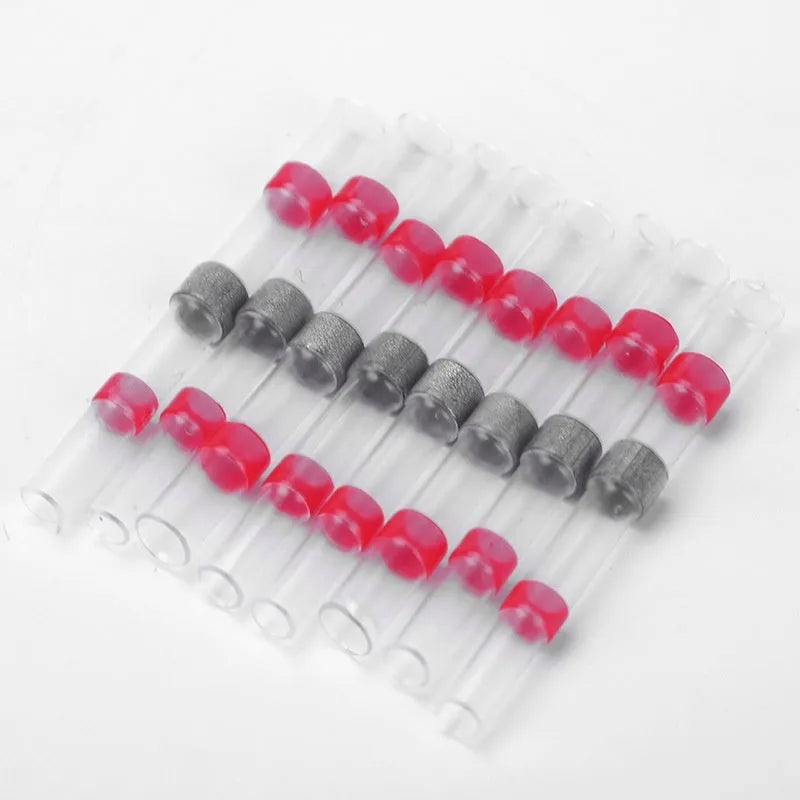 Blue, green, orange, purple, red, white, and yellow heat shrink solder ring terminals for electrical wiring.