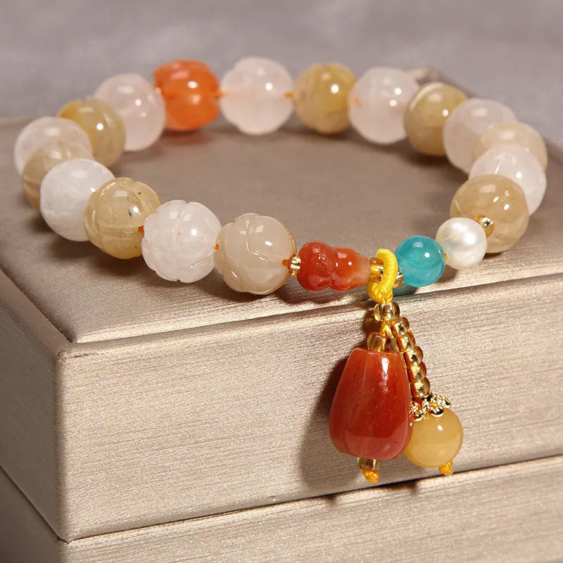 Yellow agate crystal and gold silk women's bracelet in khaki colour.