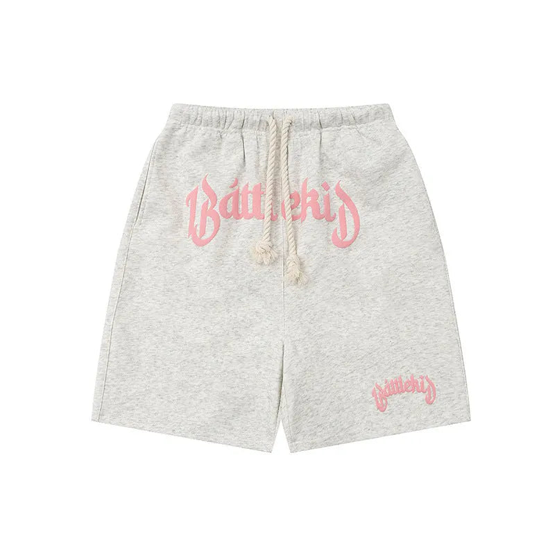 Loose-fit cropped sweatpants-style hip hop shorts in cotton blend fabric on a neutral background