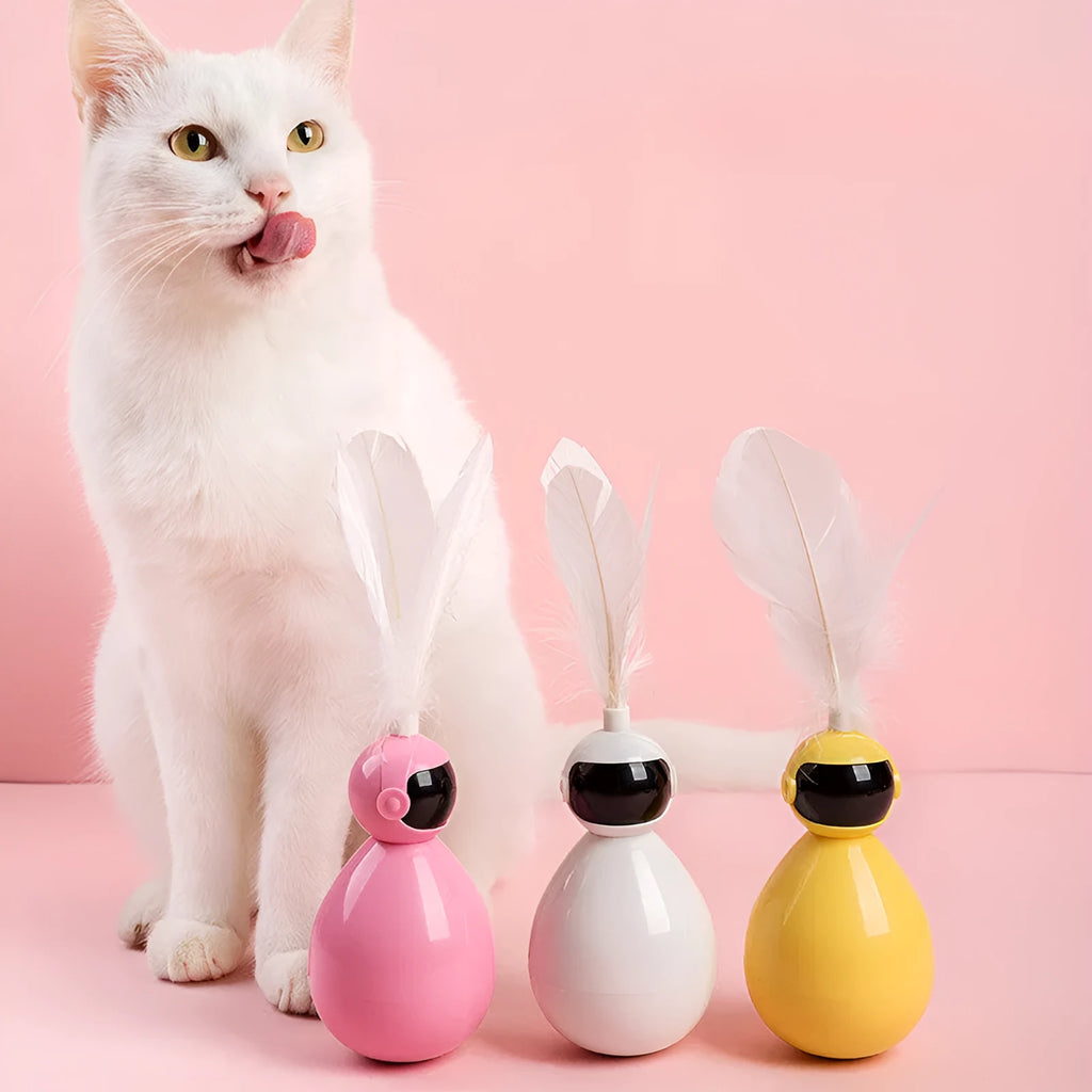 ABS tumbler cat toy with feather replacements, available in white, yellow, and pink