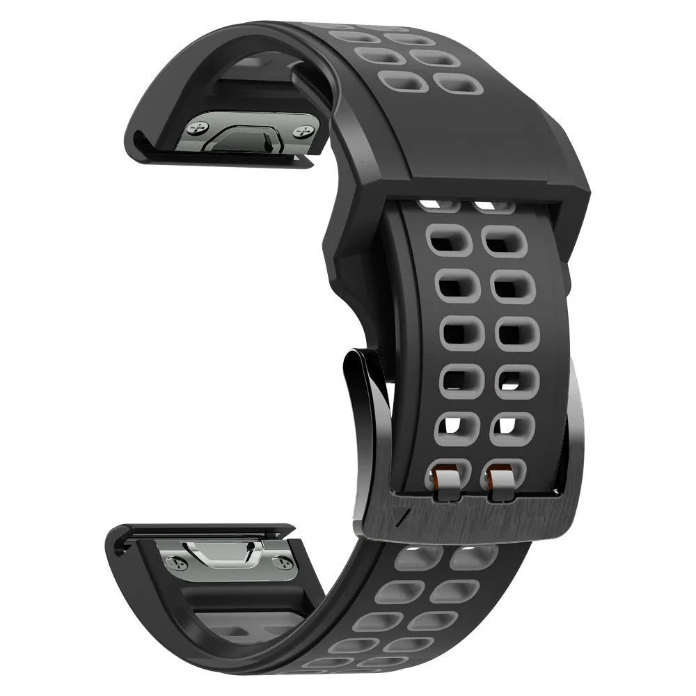 Two-colour silicone watch strap with quick-release pins showing black and orange combination on 22mm width