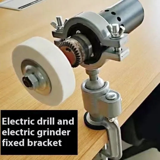 Small bracket-type bench vise with a 360-degree rotating head on a workbench.