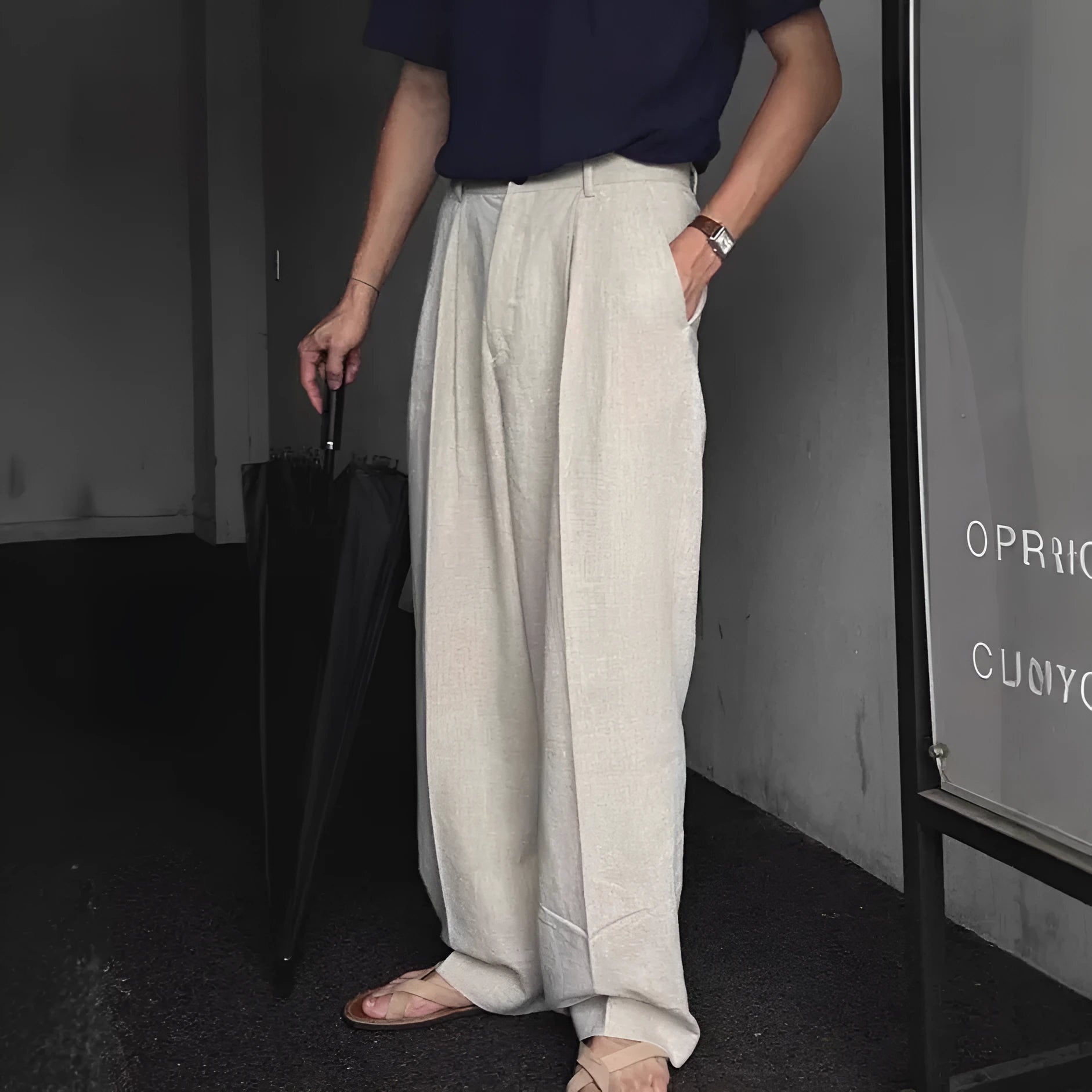 Men's apricot-coloured wide-leg cotton linen blend trousers with a mid waist and pencil pant cut.