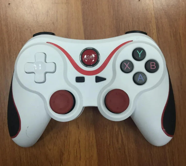 Black and white X3 Bluetooth wireless game controller for Android mobile phones with charging cable.