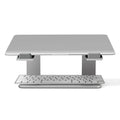 Black aluminium alloy laptop stand with ventilation slots on desktop