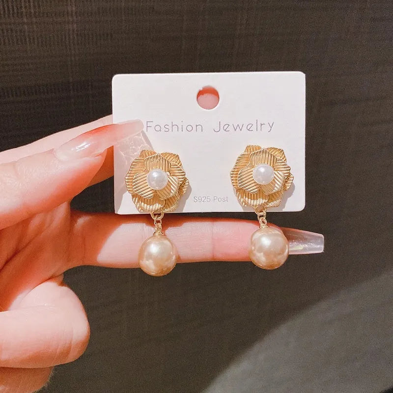 Hong Kong style gold colour floral stud earrings with opal stones and needle rose design